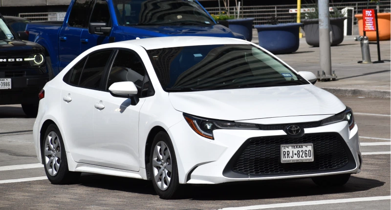 A white Toyota Corolla