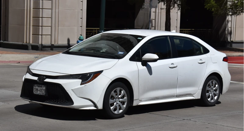 White Toyota Corolla hybrid