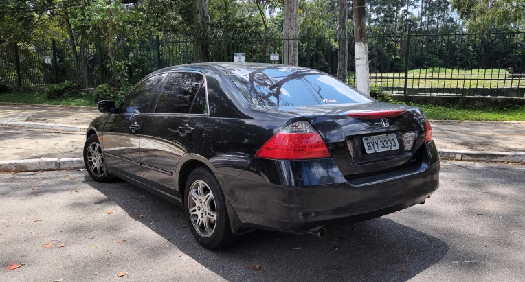 Rear view of a black Honda Accord parked on a street